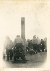 Image of Group of Eskimos [Inuit] on dock